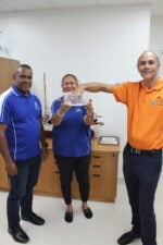Left to right: Torres Strait Regional Authority Chairperson George Nona, Economic Development’s Darlene Fell and CEO Charlie Kaddy hold the prize draw for the Torres Strait region's landmark Zenadth Kes Creative Arts survey