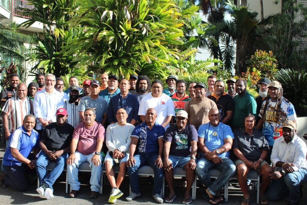 A large group of Torres Strait Islander and Aboriginal men and women as part of the PZJA advisory committee members with TSRA and GBK representatives representing the Torres Strait region, at a meeting in Cairns, Far North Queensland, Australia.