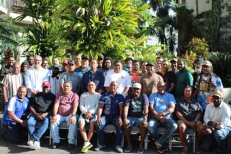 A large group of Torres Strait Islander and Aboriginal men and women as part of the PZJA advisory committee members with TSRA and GBK representatives representing the Torres Strait region, at a meeting in Cairns, Far North Queensland, Australia.