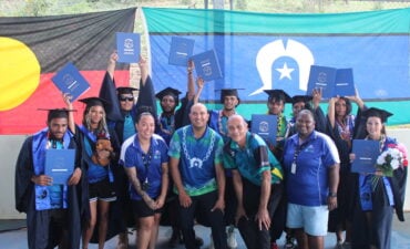Nine Tagai State College students with Torres Strait Regional Authority staff celebrate their graduation on Thursday Island in the Torres Strait region.