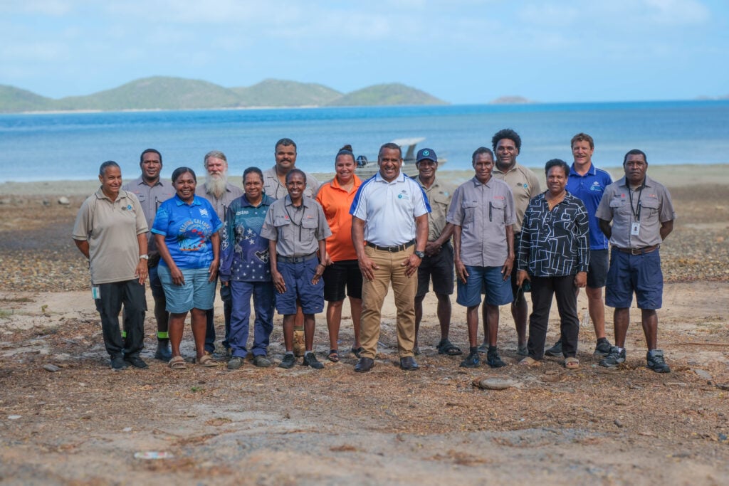 Honouring connections: TSRA Rangers and Chairperson George Nona (middle) hosted South Fly Rangers on Waiben (Thursday Island)
